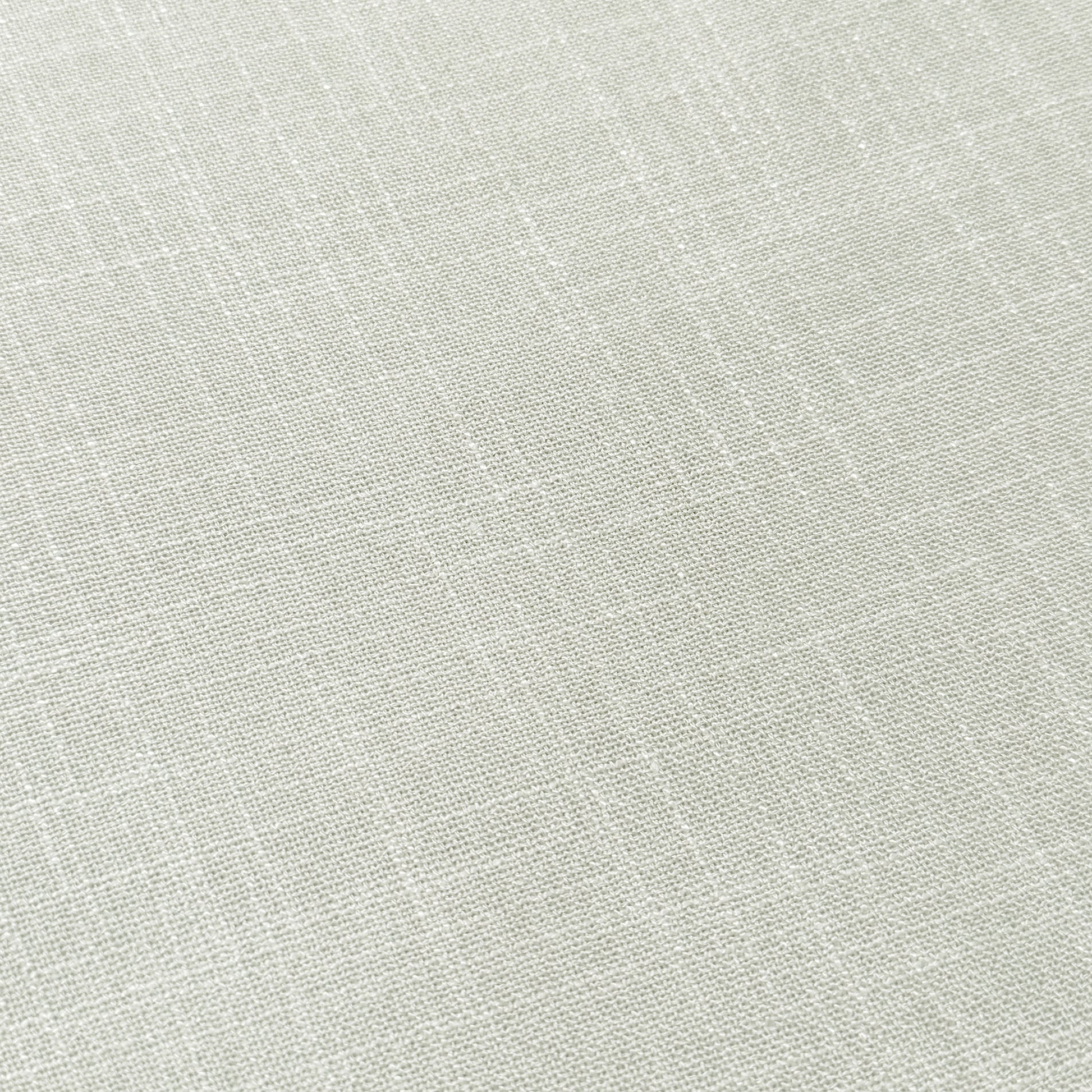 Close-up of light beige upholstered fabric texture