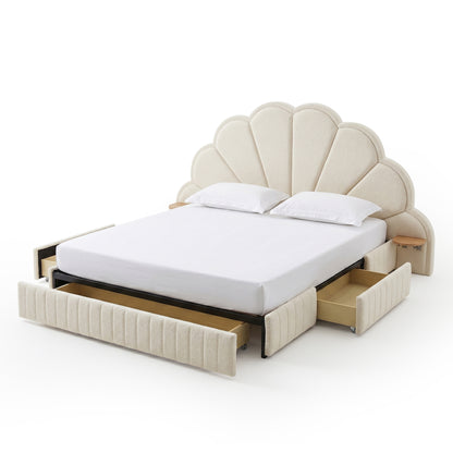 Full view of upholstered bed with scalloped headboard and open drawers on white background