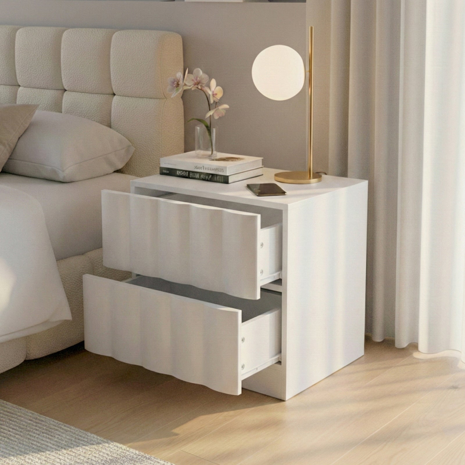 White nightstand with open drawers in bedroom