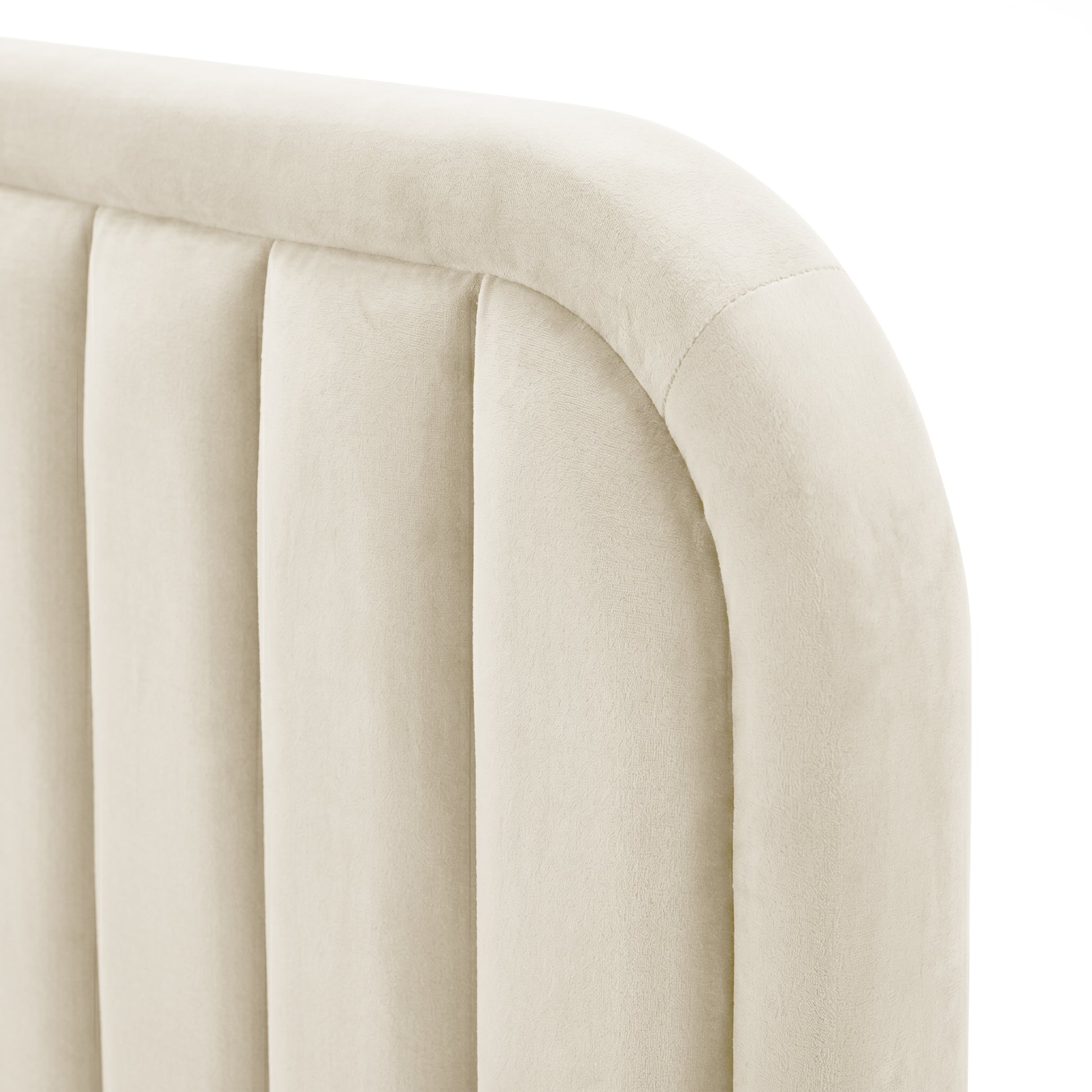 Close-up of beige upholstered channel tufting texture