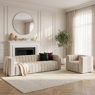 Beige sofa and armchair set styled in a modern living room
