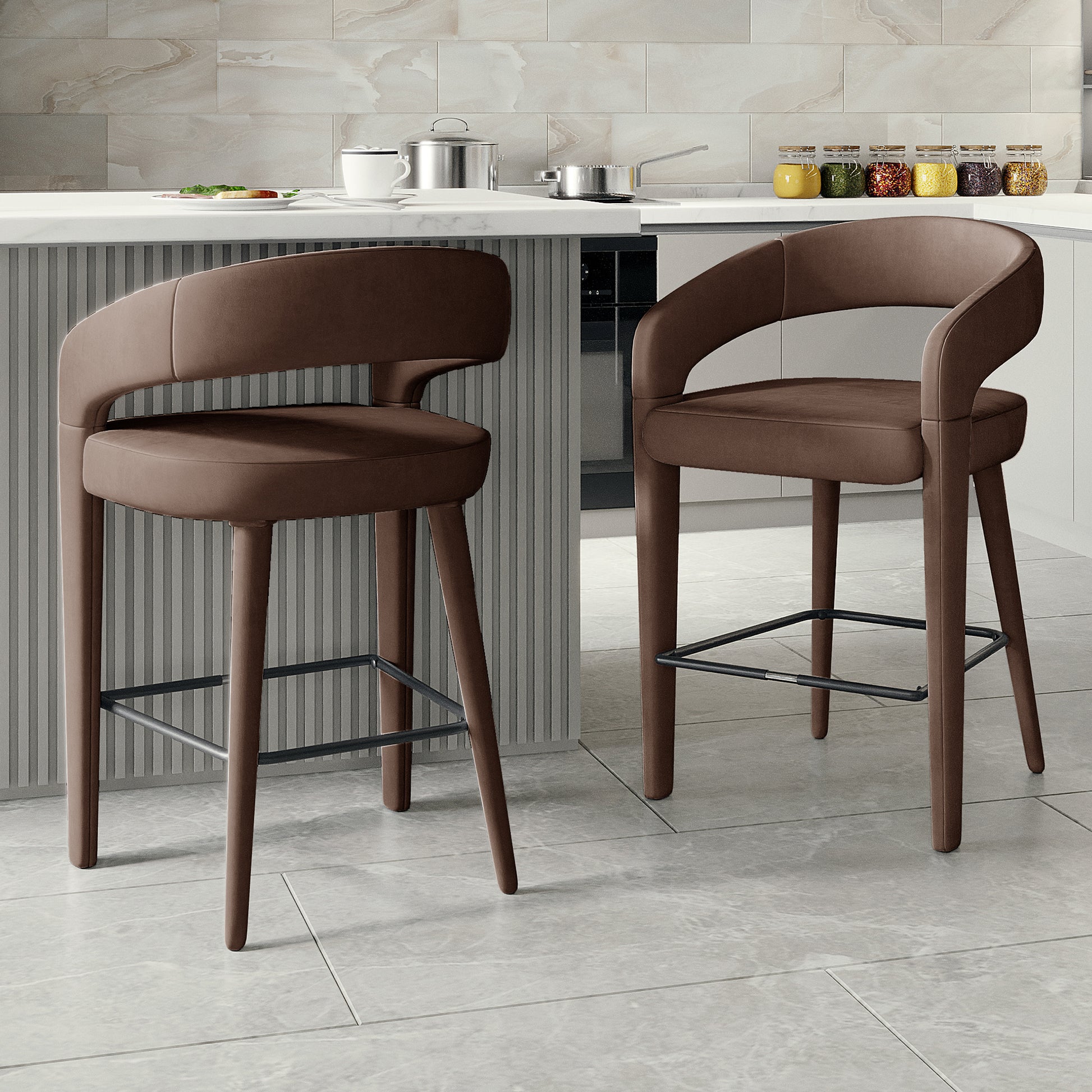 Two brown upholstered bar stools at a kitchen island with marble backsplash