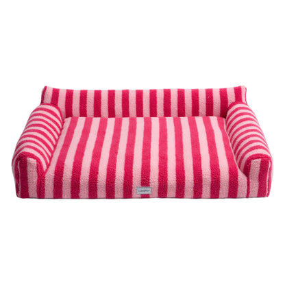 Rectangular striped pet bed with pink and light pink stripes on a white background