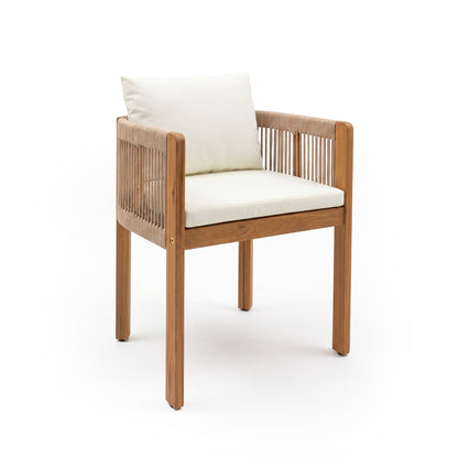 Wooden chair with white seat and back cushions on a white background