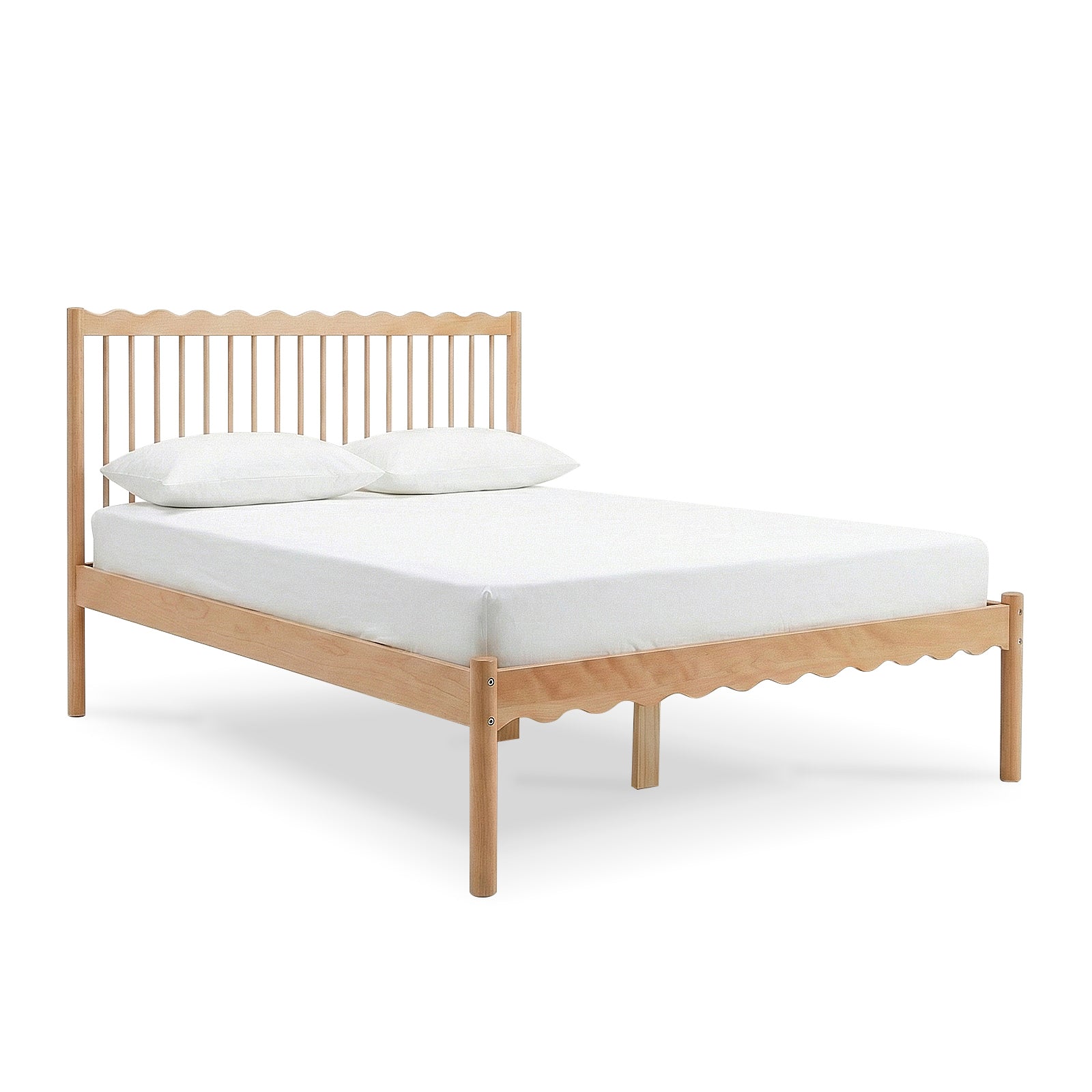 Wooden bed frame with scalloped spindle headboard and white bedding on white background
