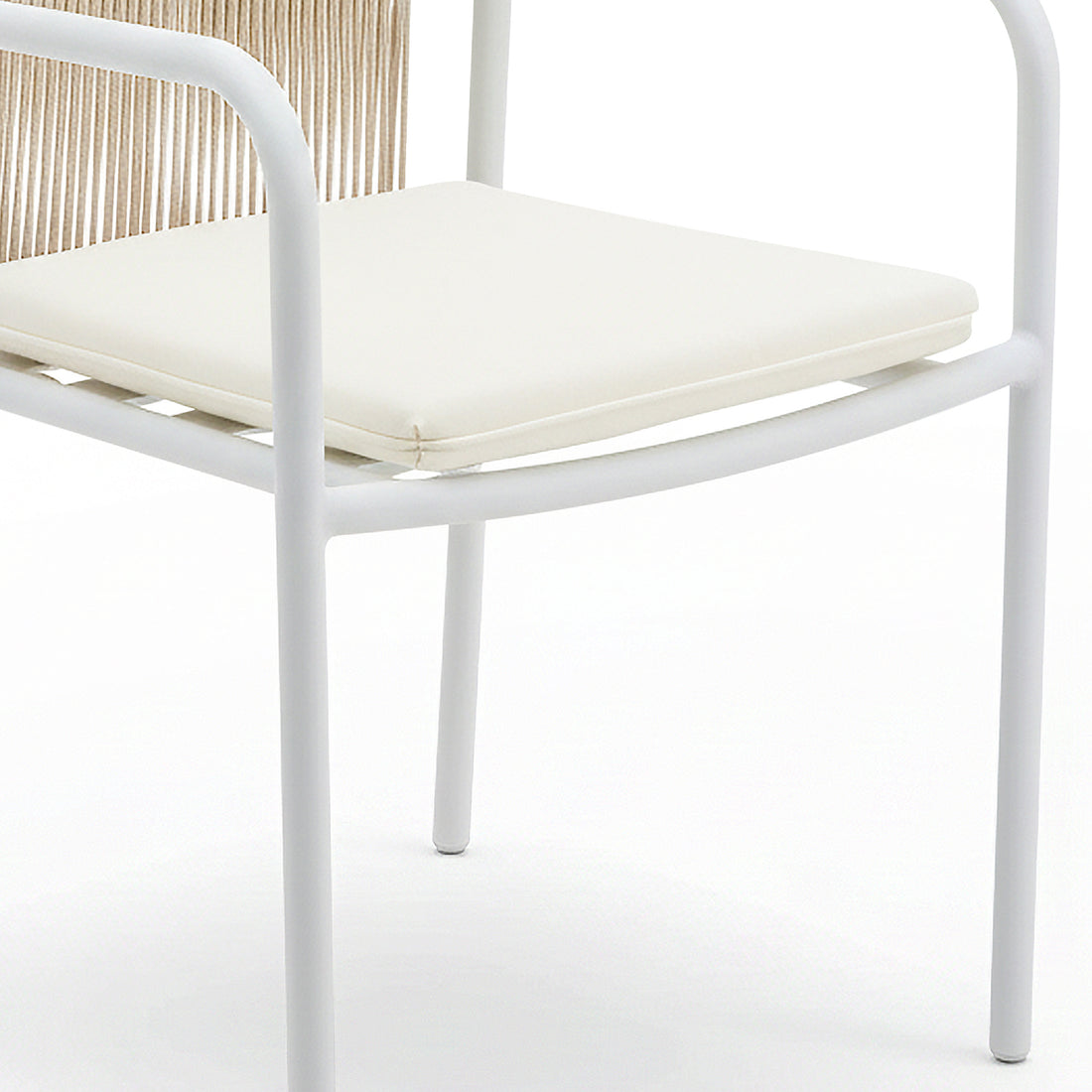 Evone 4 Seater Dining Set features a modern chair with a white tubular frame, off-white seat cushion, and woven back, part of a sleek outdoor dining arrangement.