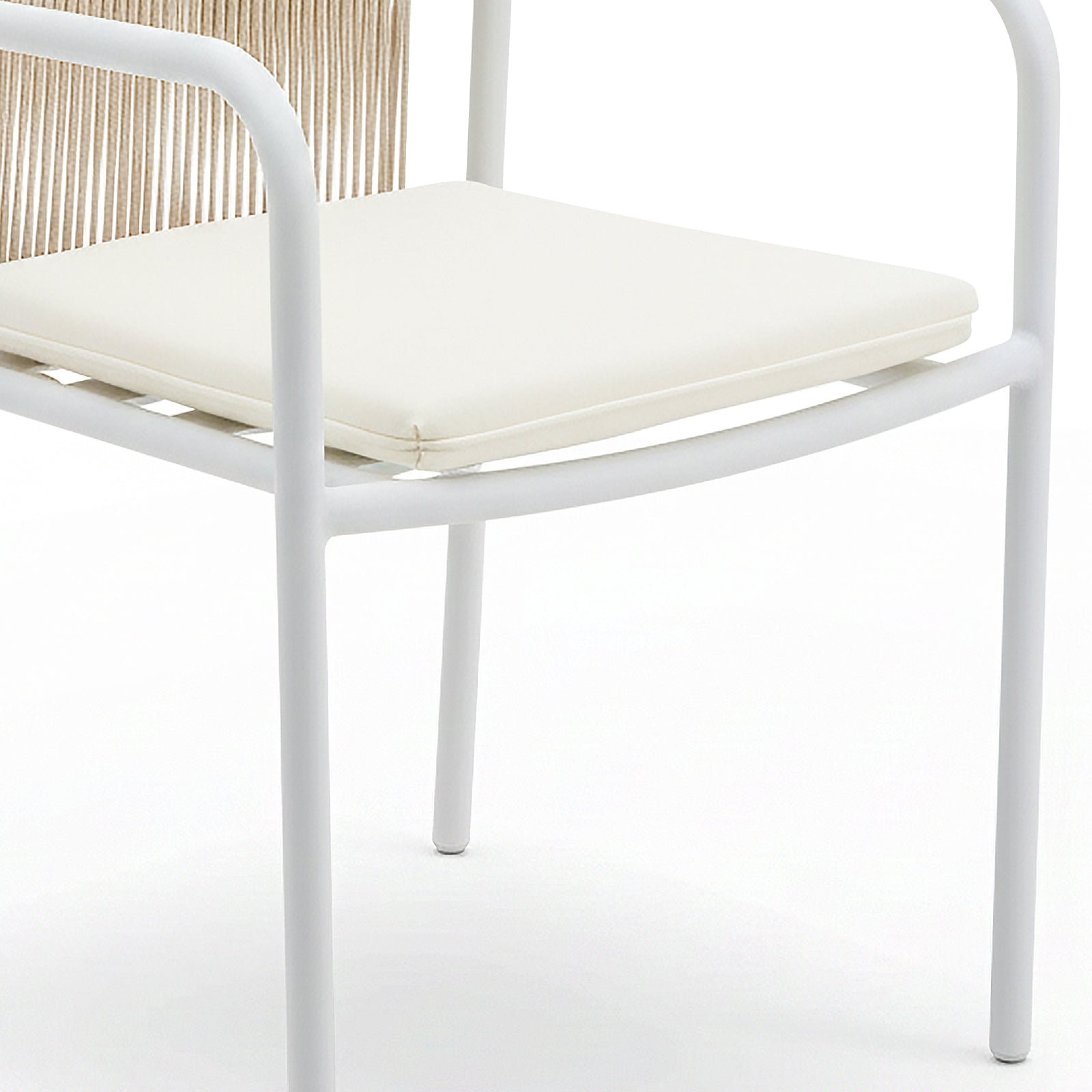 Evone 4 Seater Dining Set features a modern chair with a white tubular frame, off-white seat cushion, and woven back, part of a sleek outdoor dining arrangement.