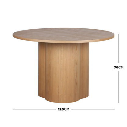 Cece 120cm Round Wooden Dining Table in Oak features a light-wood, round tabletop and cylindrical pedestal base, ideal for seating four and enhancing modern dining spaces with its minimalist design.