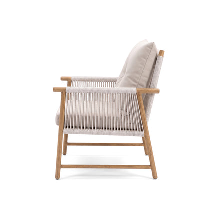 Side profile of a modern lounge chair with wooden frame and light cushions on a white background