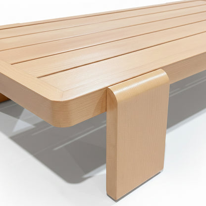 Close-up of the Modica 5 Seater Aluminium Outdoor Sofa Set in White, showcasing a minimalist slatted tabletop with softly rounded edges and a bent-plywood style leg, embodying modern elegance.