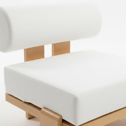 Modica 5 Seater Aluminium Outdoor Sofa Set in White features a sleek armless lounge chair with a thick upholstered seat and cylindrical bolster backrest on a light-wood frame, ideal for outdoor relaxation.