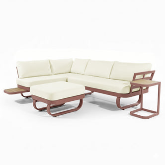 Paloma Modular Outdoor Lounge Set in Terracotta: Modern L-shaped sofa with off-white cushions, matching ottoman, and slender side table. Powder-coated metal frame, slatted wood surfaces for indoor/outdoor use.