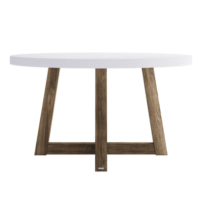 Magnus Hardwood and Concrete Outdoor Dining Table features a sleek, round white top with a rustic wooden base of intersecting angled legs, perfect for stylish alfresco dining.