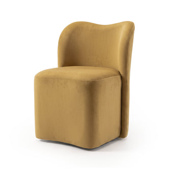 Mustard yellow upholstered accent chair on a white background