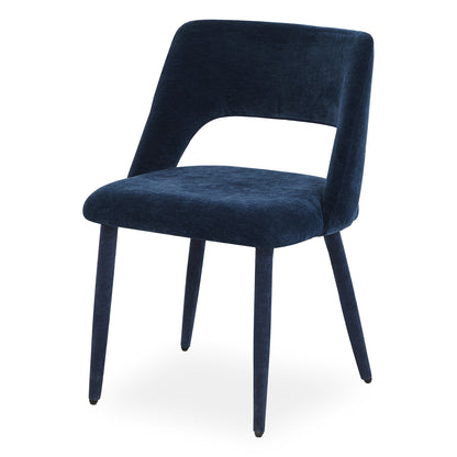 Single modern dining chair in dark blue velvet on white background, front view