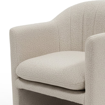 Liora Bouclé Curved Accent Armchair in Beige features a tub-style design with a plush seat cushion, gently curved back, and arms upholstered in textured fabric, highlighting modern elegance and comfort.