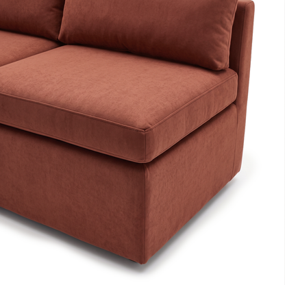 Close-up of terracotta loveseat cushion and upholstery details