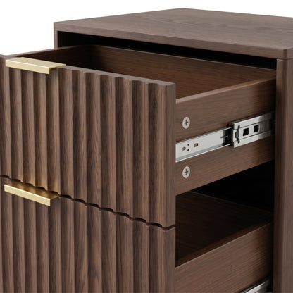 Close-up of a walnut cabinet with partially open drawers and gold handles