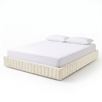 Modern upholstered bed on white background