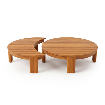 Round wooden coffee table with a crescent-shaped nesting table on a white background.