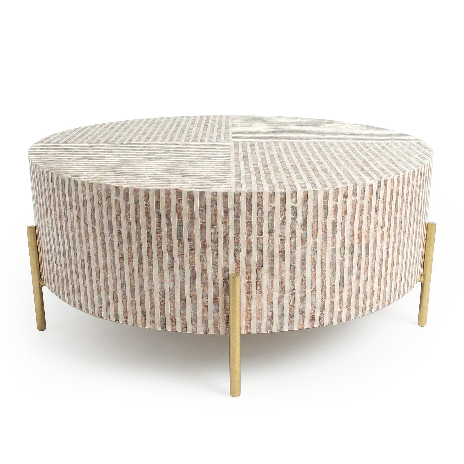 Contemporary round coffee table with textured light stone top and gold legs on white background
