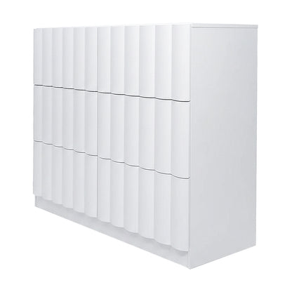 White modern storage cabinet with vertical ridged texture on white background