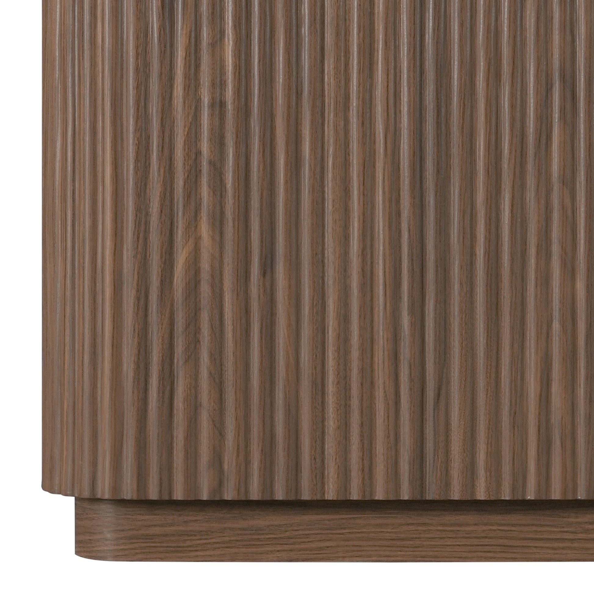 Close-up of ribbed wood texture on a furniture piece against white background