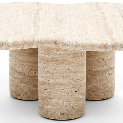 Modern stone coffee table with organic top shape on white background, slightly cropped