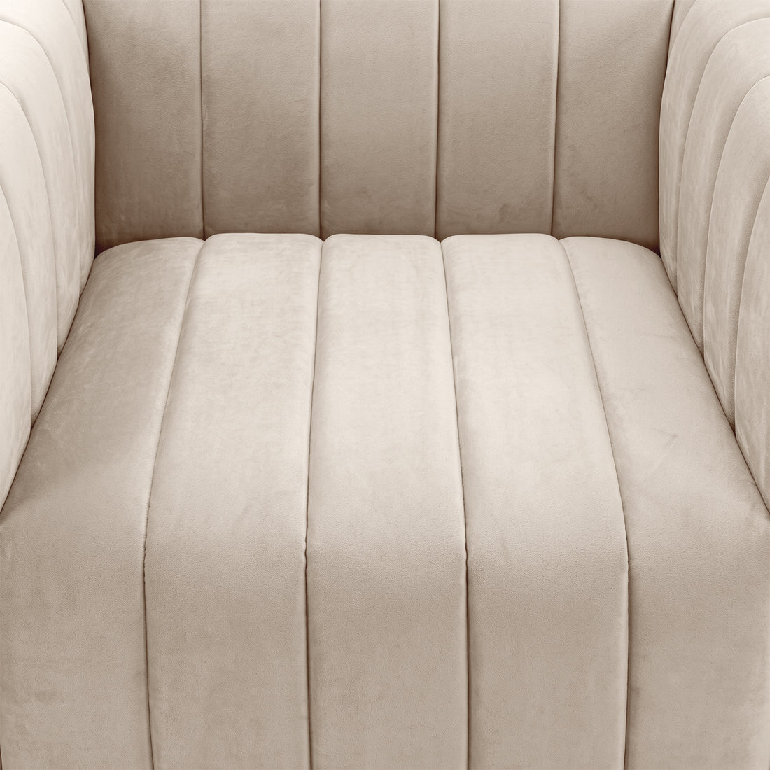 Close-up of beige upholstered seat and armrests with vertical channel tufting