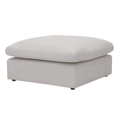 Square light beige ottoman on a white background