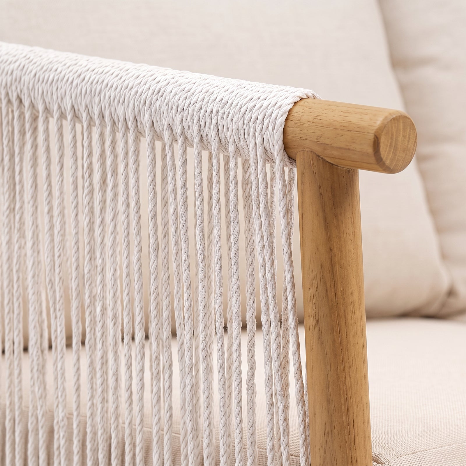 Close-up of woven rope detail on upholstered furniture in a lifestyle setting