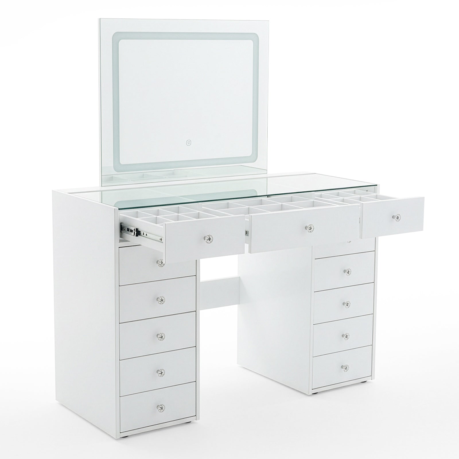 White vanity table with drawers open revealing storage compartments and lifted mirror on white background
