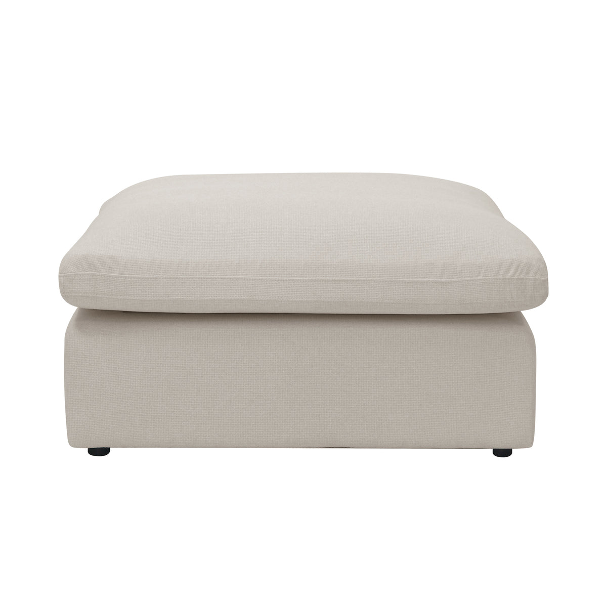 Modern light beige rectangular ottoman on a white background, shown from the front.