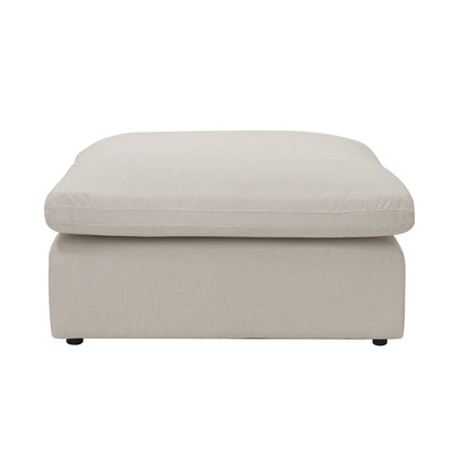Modern light beige rectangular ottoman on a white background, shown from the front.