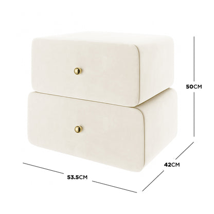 Luxo Tyla Modern Velvet Bedside Table Beige features a minimalist design with two stacked drawers, soft cream upholstery, and small brass-colored knobs, offering compact elegance and practical storage for bedrooms.