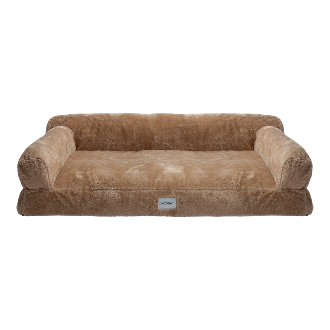 Plush tan dog bed with raised bolsters on white background