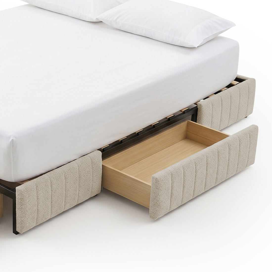 Corner of upholstered bed frame with storage drawer open on white background