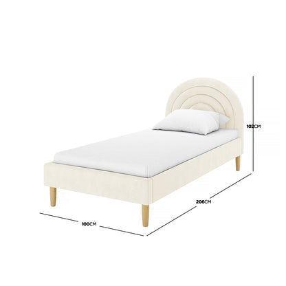 Estilla Velvet Rainbow Bed in Beige features an arched panel headboard, low footboard, and side rails in soft velvet upholstery, supported on four tapered wooden legs, perfect for cozy, modern bedrooms.