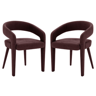 Eisha Velvet Dining Chair Set of 2 in Dark Plum, featuring curved backrest, short armrests, padded seat, and tapered legs, offers a modern, plush look with a supportive metal frame.