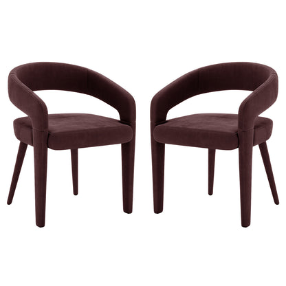 Eisha Velvet Dining Chair Set of 2 in Dark Plum, featuring curved backrest, short armrests, padded seat, and tapered legs, offers a modern, plush look with a supportive metal frame.
