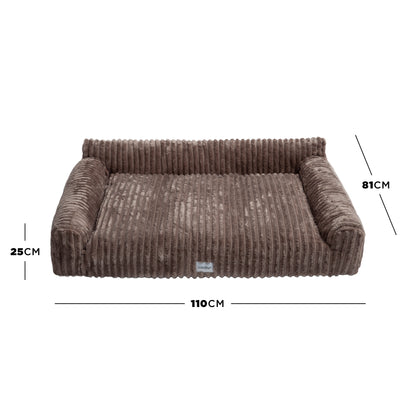 Brown corduroy pet bed with dimensions marked (110 cm W x 81 cm D x 25 cm H) on white background