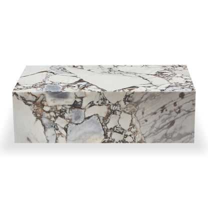 Solene 100cm Coffee Table in Blue Galaxy, a rectangular marble slab with dark veining, serves as an elegant, low-profile coffee table, enhancing any lounge with its sophisticated, natural beauty.