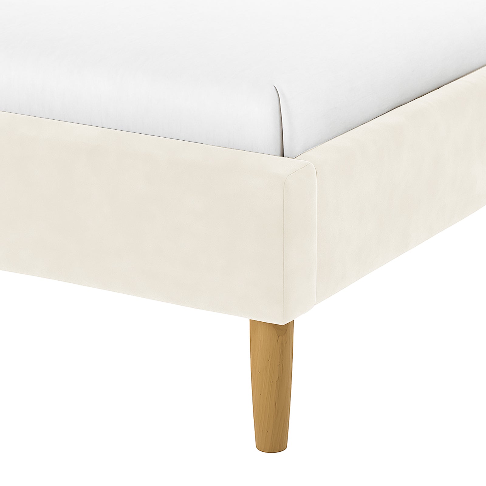Close-up of the Estilla Velvet Rainbow Bed in Beige, showcasing a white mattress on a padded cream-colored upholstered side rail, supported by a tapered wooden leg, emphasizing its elegant design.
