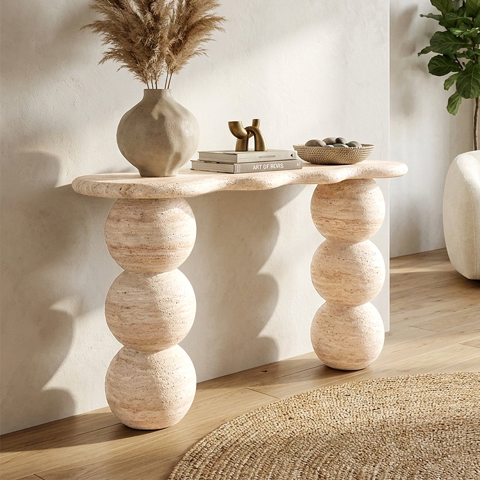 Modern sculptural console table styled in sunlit room with decor