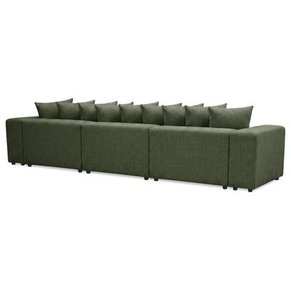 Green sectional sofa angled shot on white background