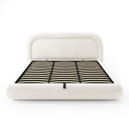 Front view of a complete cream upholstered bed frame with exposed wooden slats