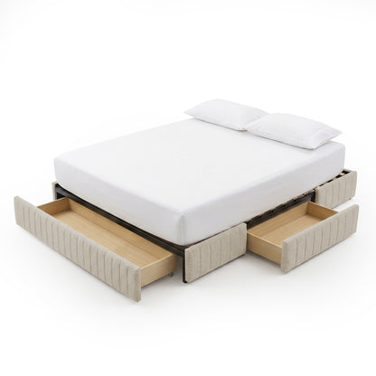 Upholstered bed with four extended under-bed drawers on a white background