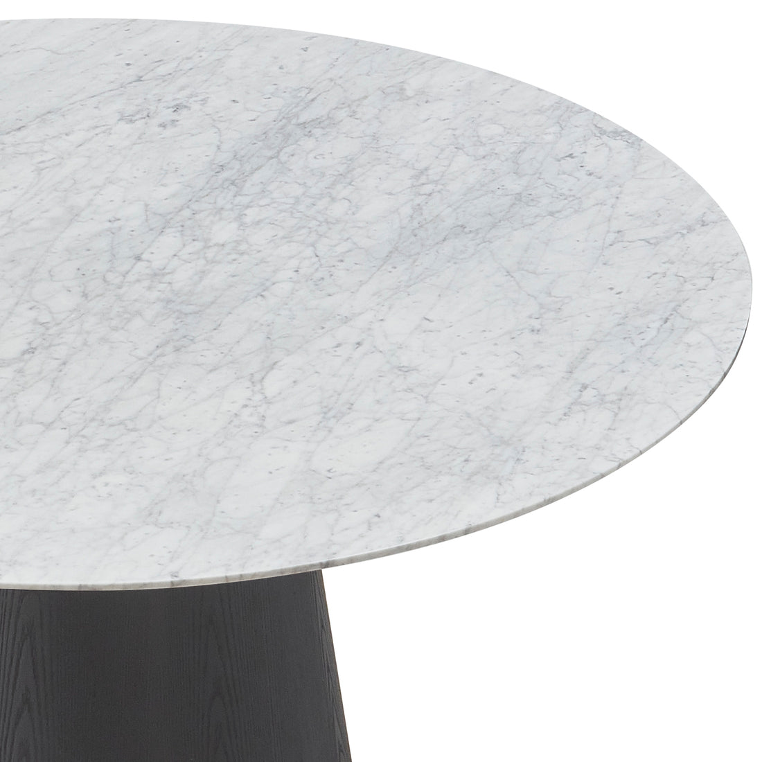 Dina 120cm Round Marble Dining Table in Carrara Black, showcasing its elegant white marble top with light gray veins and the top edge of a dark, conical wooden pedestal base.