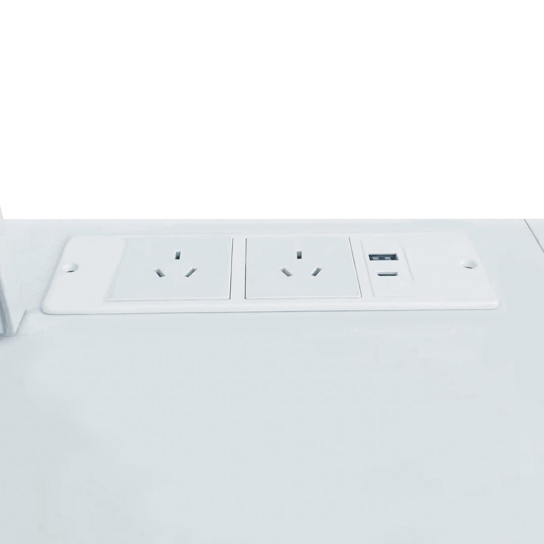 Close-up of power outlet and USB port panel on white surface