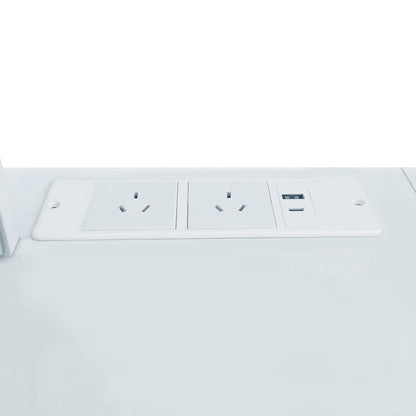 Close-up of power outlet and USB port panel on white surface